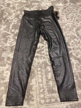 Nanette Lepore Metallic Black High-Waist Leggings has a pocket in the back
